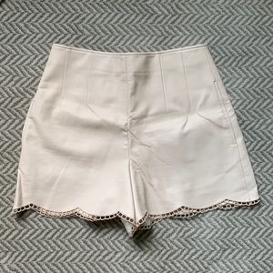 Blush club monaco scalloped faux leather shorts